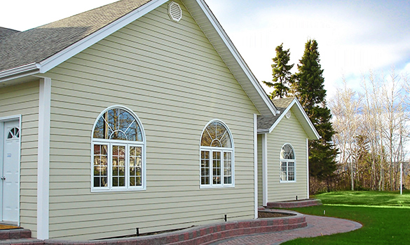 the side of a yellow house