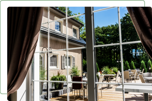 looking out a window to an uncovered patio