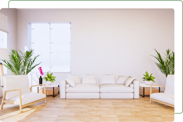 living room with a wooden floor and white furniture with a big window on the back wall