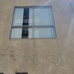 barred-window-stucco-wall-los-angeles